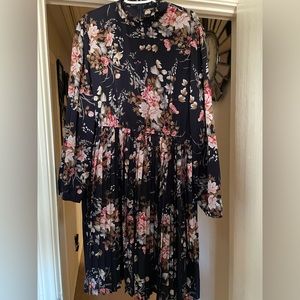 Beautiful blue pleated dress with flowers